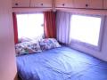 Te koop wegens gevorderde leeftijd Chausson half-integraal camper.